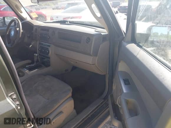 2007 Jeep Commander Sport с VIN 1J8HG48K47C567356, выставлен на аукционе IAAI как лот 42791608 с пробегом 159 517 миль миль и . История ставок и продаж доступна на DreamBid. Изображение 5.