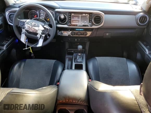 2023 Toyota Tacoma SR5 z VIN 3TMAZ5CN9PM214829, wystawiony jako Copart lot #87104895 z przebiegiem 10 509 mil mil oraz Szkoda całkowita • Salvage title. Historia ofert i sprzedaży dostępna na DreamBid. Obrazek 8.