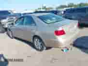 2005 Toyota Camry STD with VIN 4T1BE32KX5U084110, listed as a IAAI auction lot 43162822 with 210,556 mi miles and . Bid and sale history available at DreamBid. Image 3.