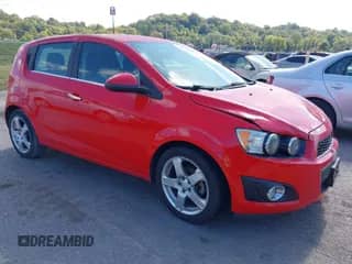 2015 Chevrolet Sonic LTZ with VIN 1G1JE6SBXF4112595, listed as a IAAI auction lot 43347444 with 100,321 mi miles and . Bid and sale history available at DreamBid. Image 1.