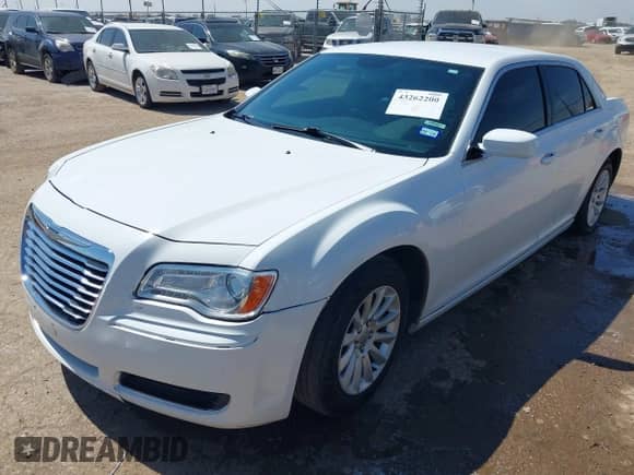 2014 Chrysler 300 with VIN 2C3CCAAG8EH288850, listed as a IAAI auction lot 43262200 with 113,254 mi miles and . Bid and sale history available at DreamBid. Image 2.