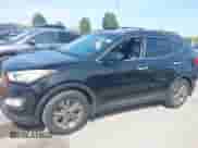 2015 Hyundai Santa Fe z VIN 5XYZU3LB0FG284923, wystawiony jako IAAI lot #43246696 z przebiegiem 96 991 mil mil oraz . Historia ofert i sprzedaży dostępna na DreamBid. Obrazek 14.