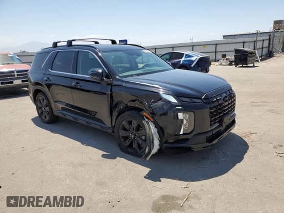 2023 Hyundai Palisade XRT с VIN KM8R34GE5PU586443, выставлен на аукционе Copart как лот 63532345 с пробегом 24 508 миль миль и Списание • Salvage title. История ставок и продаж доступна на DreamBid. Изображение 4.