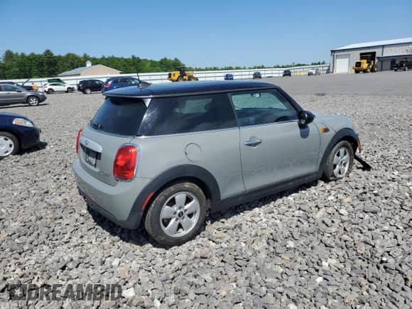 2014 MINI Hardtop with VIN WMWXM5C51ET933450, listed as a Copart auction lot 56686374 with 82,100 mi miles and Salvage title. Bid and sale history available at DreamBid. Image 3.