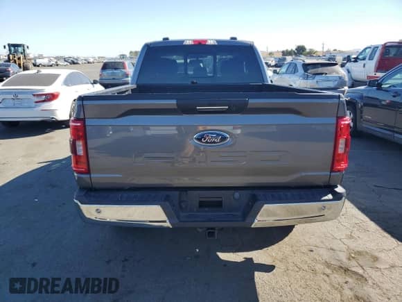2021 Ford F-150 XLT with VIN 1FTEX1C57MKE58370, listed as a Copart auction lot 74724544 with 29,283 mi miles and Salvage title. Bid and sale history available at DreamBid. Image 6.
