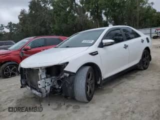 2013 Toyota Camry XLE with VIN 4T1BK1FK0DU526768, listed as a Copart auction lot 82283525 with 175,046 mi miles and Salvage title. Bid and sale history available at DreamBid. Image 1.