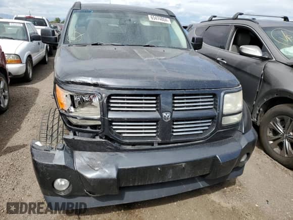 2011 Dodge Nitro Heat with VIN 1D4PU4GX9BW517670, listed as a Copart auction lot 65474804 with 194,660 mi miles and Salvage title. Bid and sale history available at DreamBid. Image 5.