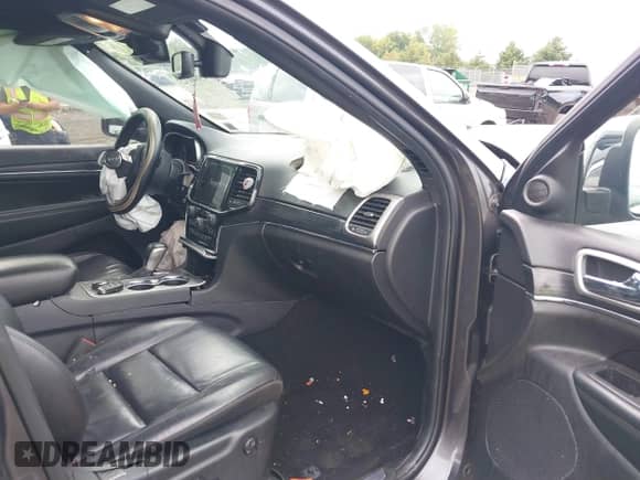 2019 Jeep Grand Cherokee Limited with VIN 1C4RJFBG8KC756596, listed as a IAAI auction lot 43040323 with 102,922 mi miles and . Bid and sale history available at DreamBid. Image 5.
