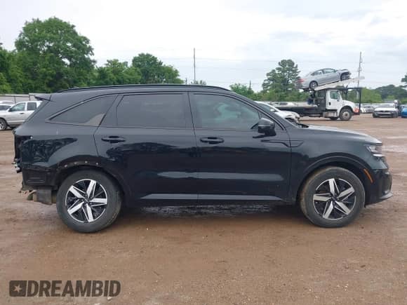 2023 Kia Sorento EX with VIN 5XYRH4LF8PG201804, listed as a IAAI auction lot 42096682 with 50,934 mi miles and . Bid and sale history available at DreamBid. Image 14.