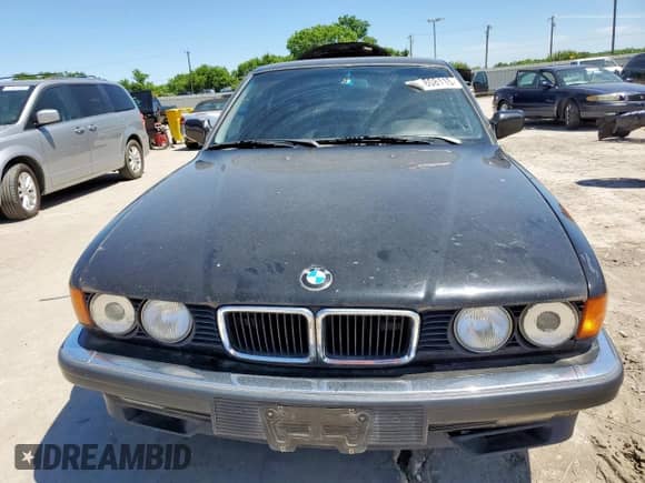 1994 BMW 7 Series с VIN WBAGD4326RDE68022, выставлен на аукционе Copart как лот 57808115 с пробегом 220 431 миль миль и Чистый • Clean title. История ставок и продаж доступна на DreamBid. Изображение 5.