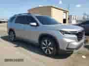 2023 Honda Pilot Touring с VIN 5FNYG1H71PB039231, выставлен на аукционе Copart как лот 61742805 с пробегом 39 920 миль миль и Списание • Salvage title. История ставок и продаж доступна на DreamBid. Изображение 4.