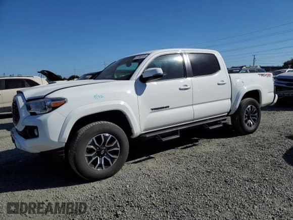 2022 Toyota Tacoma SR с VIN 3TMCZ5AN1NM504958, выставлен на аукционе Copart как лот 81156135 с пробегом 26 327 миль миль и Списание • Salvage title. История ставок и продаж доступна на DreamBid. Изображение 1.