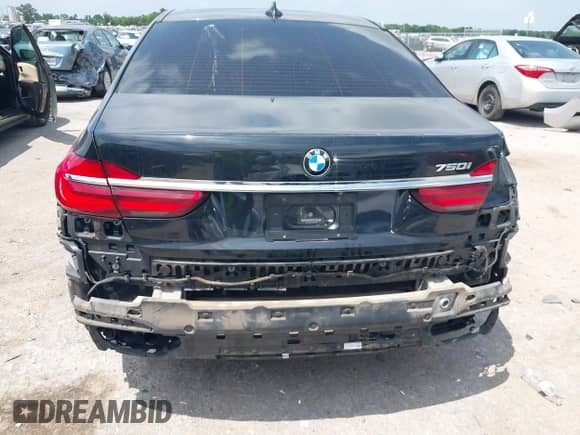 2018 BMW 7 Series 750i with VIN WBA7F0C57JGM23748, listed as a IAAI auction lot 42374137 with 111,120 mi miles and . Bid and sale history available at DreamBid. Image 16.