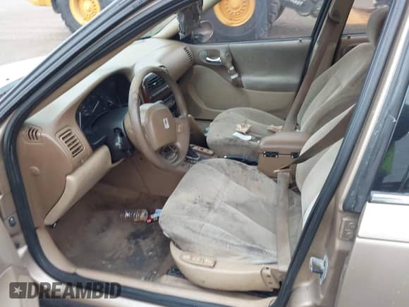 2001 Saturn LS z VIN 1G8JU54F31Y554702, wystawiony jako IAAI lot #43423433 z przebiegiem Nie podano mil oraz . Historia ofert i sprzedaży dostępna na DreamBid. Obrazek 5.