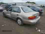 2000 Chevrolet Prizm z VIN 1Y1SK5486YZ434393, wystawiony jako Copart lot #57479105 z przebiegiem 41 990 mil mil oraz Szkoda całkowita • Salvage title. Historia ofert i sprzedaży dostępna na DreamBid. Obrazek 2.