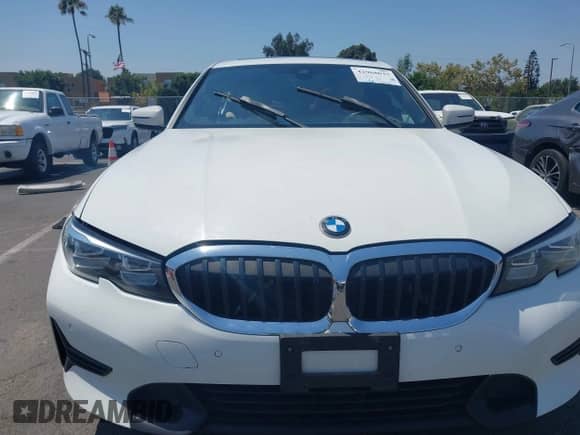 2019 BMW 3 Series 330i with VIN WBA5R1C5XKAJ99920, listed as a IAAI auction lot 42968037 with 122,464 mi miles and . Bid and sale history available at DreamBid. Image 12.