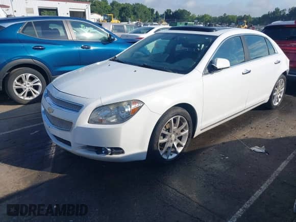 2012 Chevrolet Malibu LTZ 1LZ z VIN 1G1ZE5E09CF176036, wystawiony jako IAAI lot #42863415 z przebiegiem 250 728 mil mil oraz . Historia ofert i sprzedaży dostępna na DreamBid. Obrazek 16.