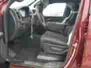 2025 Ram 1500 Tradesman with VIN 1C6RRFGG8SN601592, listed as a Copart auction lot 57250265 with Not provided miles and Salvage title. Bid and sale history available at DreamBid. Image 7.