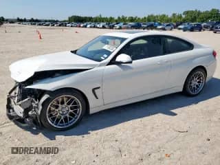 2019 BMW 4 Series 430i with VIN WBA4W3C57KAG91422, listed as a Copart auction lot 71100255 with 91,847 mi miles and Salvage title. Bid and sale history available at DreamBid. Image 1.