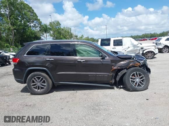 2017 Jeep Grand Cherokee Limited with VIN 1C4RJEBG8HC731720, listed as a IAAI auction lot 42763258 with 94,058 mi miles and . Bid and sale history available at DreamBid. Image 12.
