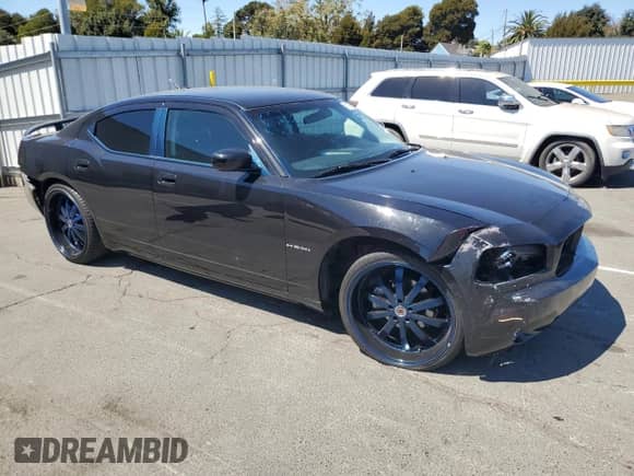 2010 Dodge Charger with VIN 2B3CA4CD3AH144303, listed as a Copart auction lot 71271665 with 195,825 mi miles and Salvage title. Bid and sale history available at DreamBid. Image 4.