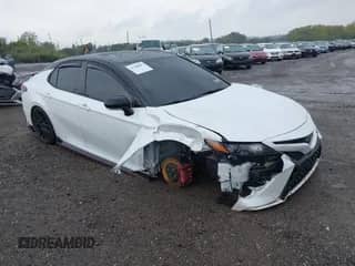 2022 Toyota Camry TRD with VIN 4T1KZ1AK3NU069359, listed as a IAAI auction lot 43308807 with 32,142 mi miles and . Bid and sale history available at DreamBid. Image 1.