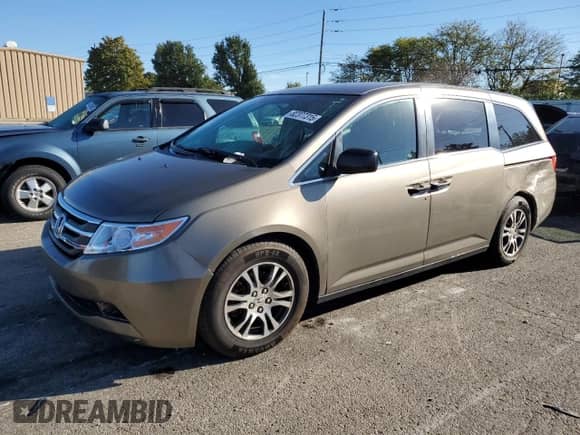 2011 Honda Odyssey LX with VIN 5FNRL5H28BB021474, listed as a Copart auction lot 82377315 with 226,433 mi miles and Salvage title. Bid and sale history available at DreamBid. Image 1.