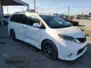 2015 Toyota Sienna SE with VIN 5TDXK3DC2FS604847, listed as a Copart auction lot 71674565 with 86,782 mi miles and Salvage title. Bid and sale history available at DreamBid. Image 4.