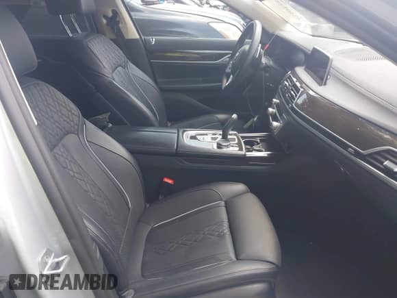 2020 BMW 7 Series 740i with VIN WBA7T2C03LCD57821, listed as a IAAI auction lot 42405287 with 69,161 mi miles and . Bid and sale history available at DreamBid. Image 5.