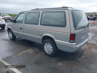 1993 Dodge Caravan Grand SE with VIN 1B4GH44R7PX729957, listed as a IAAI auction lot 41932278 with 176,577 mi miles and . Bid and sale history available at DreamBid. Image 3.