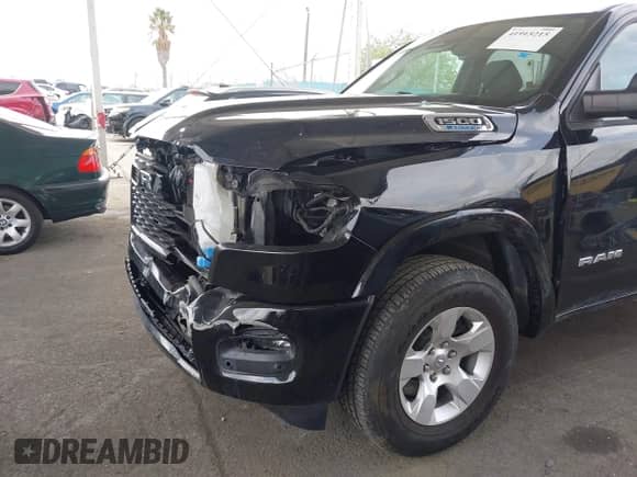 2025 Ram 1500 Big Horn z VIN 1C6RRFFG7SN506037, wystawiony jako IAAI lot #41915215 z przebiegiem 2 137 mil mil oraz . Historia ofert i sprzedaży dostępna na DreamBid. Obrazek 17.