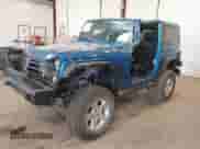 2015 Jeep Wrangler Rubicon Hard Rock z VIN 1C4BJWCG3FL568848, wystawiony jako IAAI lot #42243059 z przebiegiem 60 860 mil mil oraz . Historia ofert i sprzedaży dostępna na DreamBid. Obrazek 17.