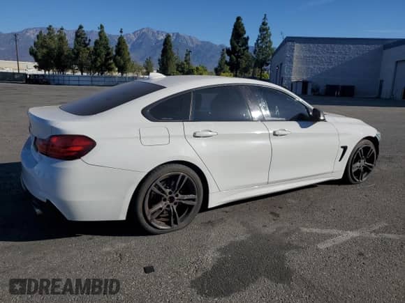 2015 BMW 4 Series 428i z VIN WBA4A9C58FGL85766, wystawiony jako Copart lot #69790975 z przebiegiem 93 413 mil mil oraz Szkoda całkowita • Salvage title. Historia ofert i sprzedaży dostępna na DreamBid. Obrazek 3.