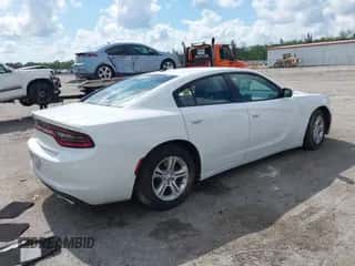 2020 Dodge Charger SXT with VIN 2C3CDXBG4LH247689, listed as a IAAI auction lot 42875432 with 90,588 mi miles and . Bid and sale history available at DreamBid. Image 4.