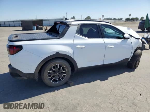 2023 Hyundai Santa Cruz SEL Premium с VIN 5NTJDDAF8PH061792, выставлен на аукционе Copart как лот 69551065 с пробегом 47 831 миль миль и Списание • Salvage title. История ставок и продаж доступна на DreamBid. Изображение 3.