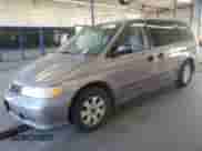1999 Honda Odyssey LX with VIN 2HKRL1850XH503979, listed as a Copart auction lot 80888115 with 269,275 mi miles and Clean title. Bid and sale history available at DreamBid. Image 1.