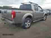 2005 Nissan Frontier LE с VIN 1N6AD07W15C435387, выставлен на аукционе Copart как лот 82041215 с пробегом 191 231 миль миль и Списание • Salvage title. История ставок и продаж доступна на DreamBid. Изображение 3.