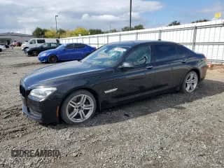 2015 BMW 7 Series 750Li with VIN WBAYE8C5XFD782333, listed as a Copart auction lot 86481565 with 143,204 mi miles and Salvage title. Bid and sale history available at DreamBid. Image 1.