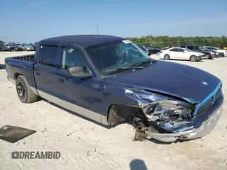 2001 Dodge Dakota Sport z VIN 1B7GL2AN11S171390, wystawiony jako Copart lot #71833495 z przebiegiem 237 486 mil mil oraz Szkoda całkowita • Salvage title. Historia ofert i sprzedaży dostępna na DreamBid. Obrazek 4.