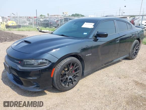 2020 Dodge Charger R/T with VIN 2C3CDXCT3LH136501, listed as a IAAI auction lot 42279799 with 86,929 mi miles and . Bid and sale history available at DreamBid. Image 2.