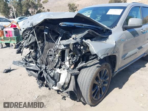 2020 Jeep Grand Cherokee Laredo E with VIN 1C4RJEAG3LC247027, listed as a IAAI auction lot 42538279 with 97,601 mi miles and . Bid and sale history available at DreamBid. Image 6.