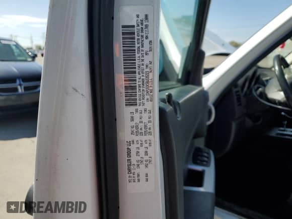 2011 Dodge Nitro SXT z VIN 1D4PU5GK5BW535223, wystawiony jako Copart lot #54922795 z przebiegiem 201 650 mil mil oraz Szkoda całkowita • Salvage title. Historia ofert i sprzedaży dostępna na DreamBid. Obrazek 13.