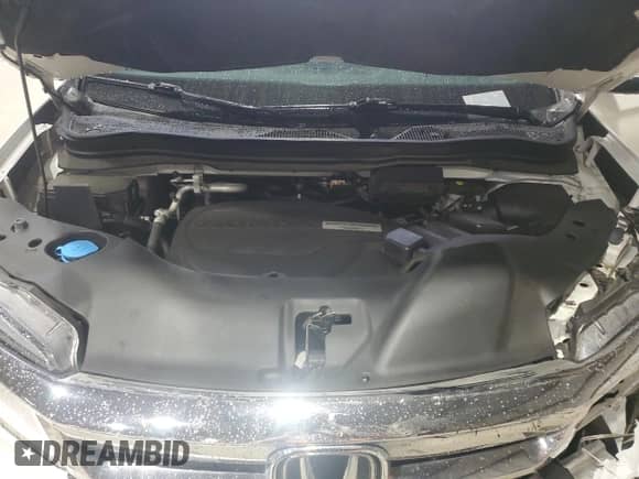 2020 Honda Pilot Touring 8-Passenger z VIN 5FNYF5H94LB003376, wystawiony jako Copart lot #61001285 z przebiegiem 73 291 mil mil oraz Szkoda całkowita • Salvage title. Historia ofert i sprzedaży dostępna na DreamBid. Obrazek 12.