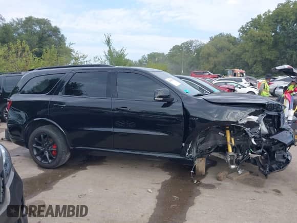 2023 Dodge Durango SRT 392 with VIN 1C4SDJGJ3PC696394, listed as a IAAI auction lot 43189329 with 16,108 mi miles and . Bid and sale history available at DreamBid. Image 14.