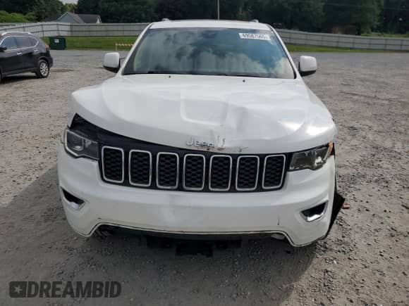 2020 Jeep Grand Cherokee Laredo E with VIN 1C4RJEAG7LC140868, listed as a Copart auction lot 69587565 with 76,879 mi miles and Salvage title. Bid and sale history available at DreamBid. Image 5.