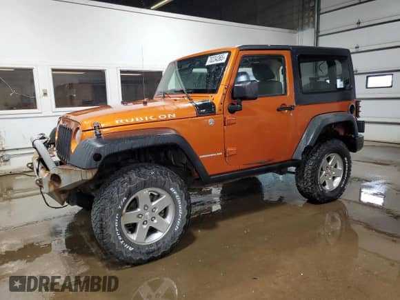 2011 Jeep Wrangler Rubicon with VIN 1J4BA6D11BL573772, listed as a Copart auction lot 70234365 with 118,181 mi miles and Clean title. Bid and sale history available at DreamBid. Image 1.
