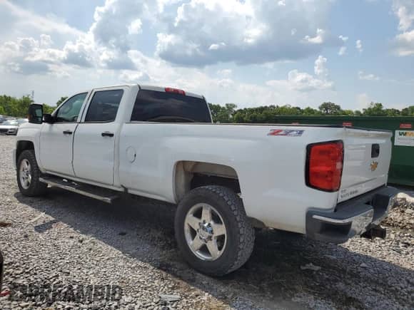 2017 Chevrolet Silverado 2500HD Work Truck with VIN 1GC1KUEG8HF199769, listed as a Copart auction lot 62151195 with 61,225 mi miles and Salvage title. Bid and sale history available at DreamBid. Image 2.