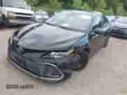 2022 Toyota Camry Hybrid LE with VIN 4T1C31AK3NU585808, listed as a IAAI auction lot 42633297 with 34,066 mi miles and . Bid and sale history available at DreamBid. Image 17.