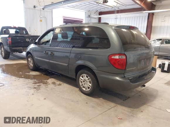2005 Dodge Caravan SE with VIN 1D4GP24R05B206321, listed as a IAAI auction lot 43407335 with 206,806 mi miles and . Bid and sale history available at DreamBid. Image 3.