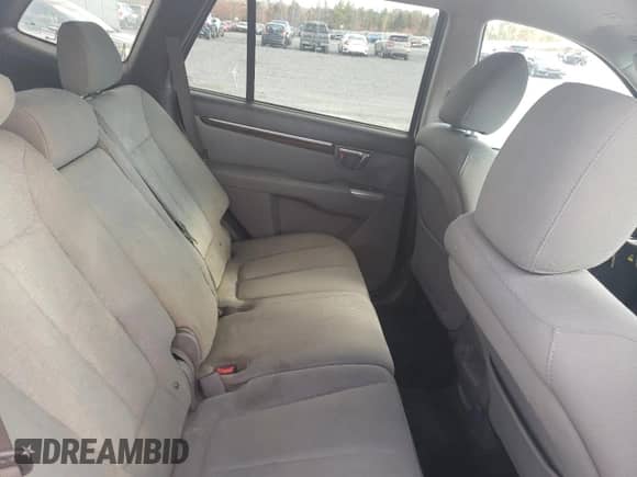 2012 Hyundai Santa Fe GLS с VIN 5XYZG4AG5CG137410, выставлен на аукционе Copart как лот 82390515 с пробегом 218 770 миль миль и Чистый • Clean title. История ставок и продаж доступна на DreamBid. Изображение 11.